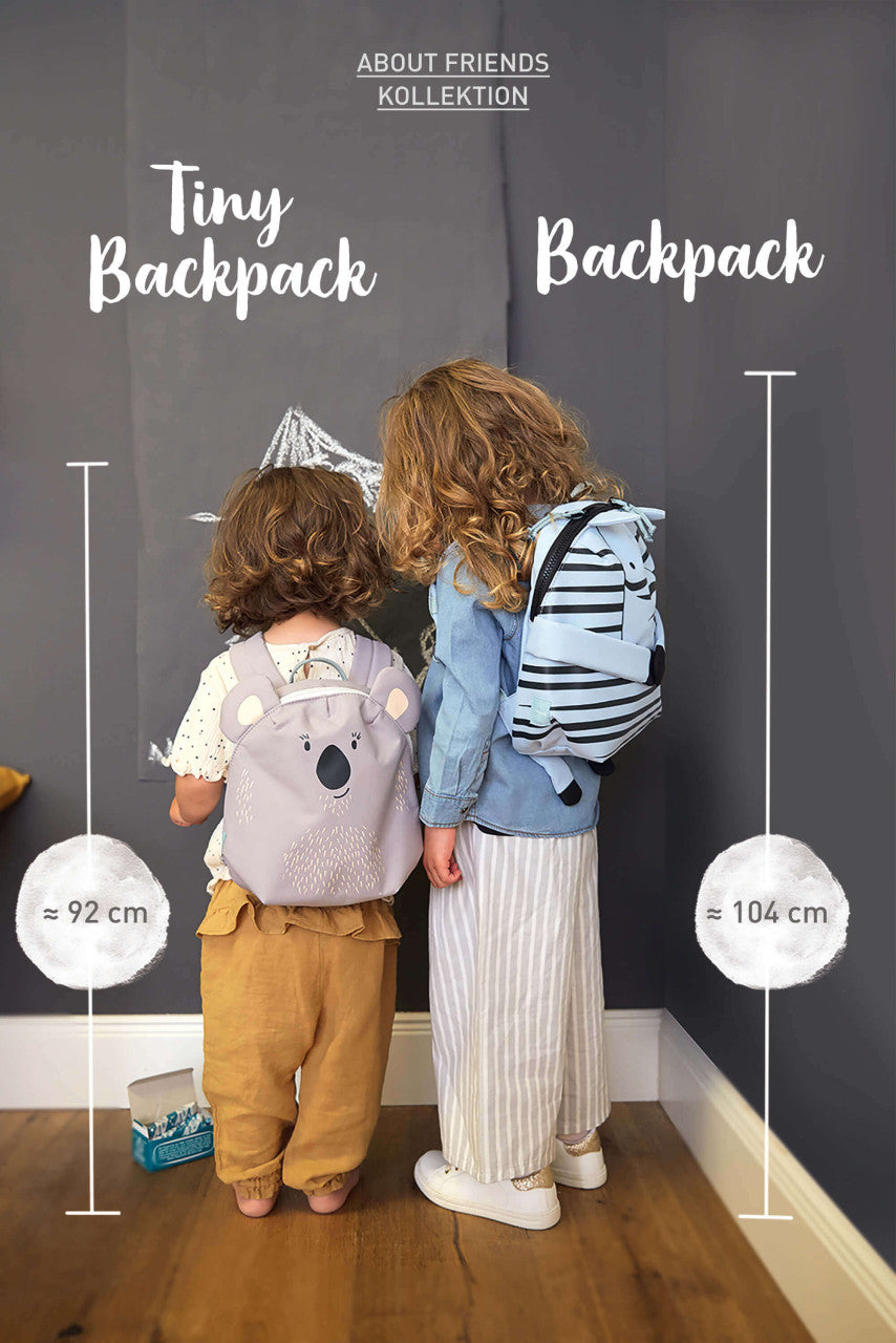 Kind trägt den LÄSSIG Kinderrucksack Tiny Löwe Gelb bei Bärechind Winterthur Zürich Schweiz