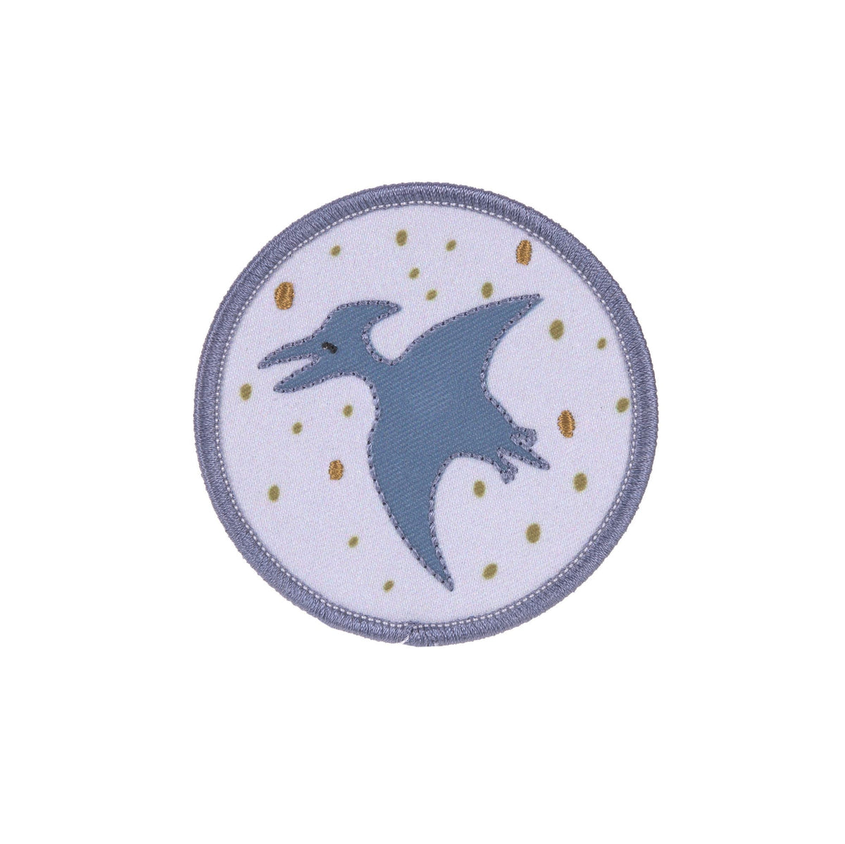 Runde Patch mit fliegendem Dinosaurier auf violettem Hintergrund aus dem Laessig Dinosaurier Set.