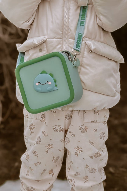 Silikon Tasche im Dino-Design für die Zoofamily Kinderkamera, erhältlich bei Bärechind Winterthur.