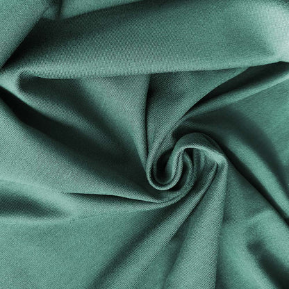 Detailaufnahme des weichen Stoffes der salbeigrünen Babyhose. Erhältlich im Bärechind Winterthur.