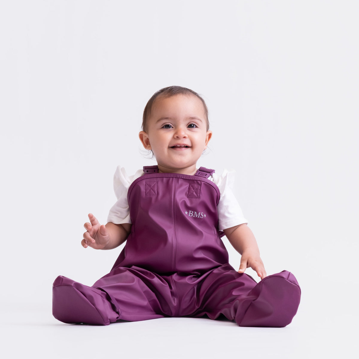 BMS BabyBuddy lila wasserdichte Regenhose mit integrierten Füssen für Babys
