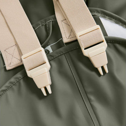 Detail der verstellbaren Träger an der CeLaVi Regenhose für Kinder, Bärechind Winterthur, Zürich, Schweiz