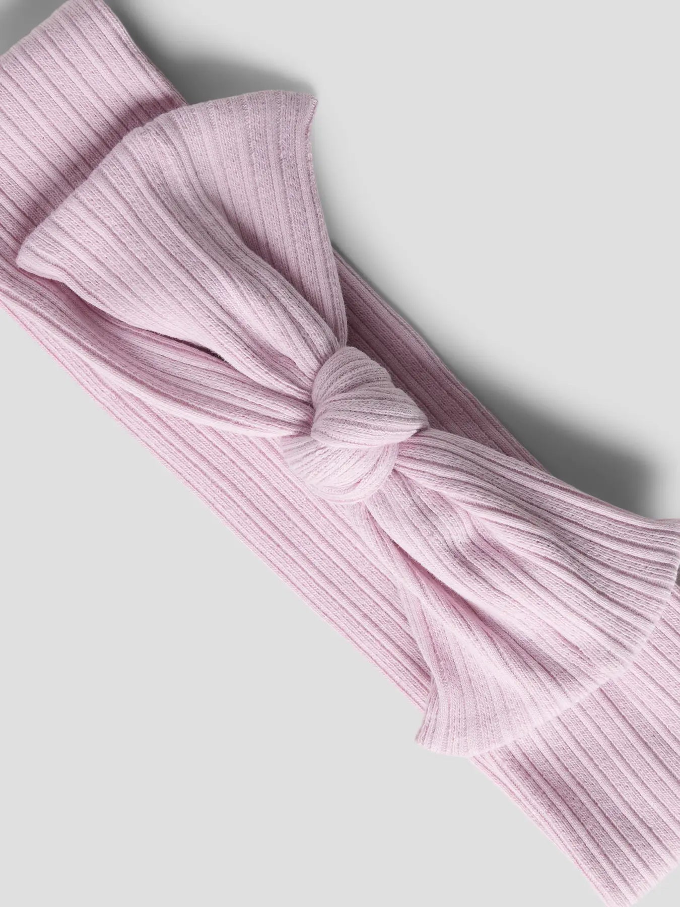 Detailansicht rosa Rippstrick Haarband für Kinder von name it im Bärechind Winterthur Zürich Schweiz