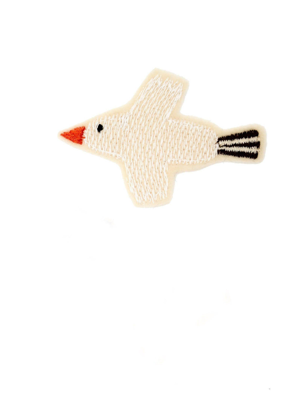 Das Bügelbild Vogel von Halfbird in Creme mit roten und schwarzen Details. Erhältlich im Bärechind Winterthur.