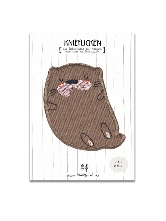 Verpackter Otter-Knieflicken von Halfbird – süss & nachhaltig, erhältlich in Winterthur, Schweiz.
