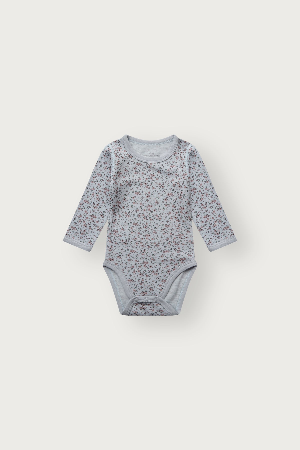 Baloo Merino/Bambus Langarmbody mit Blumenprint in A Bit Blue, Vorderansicht