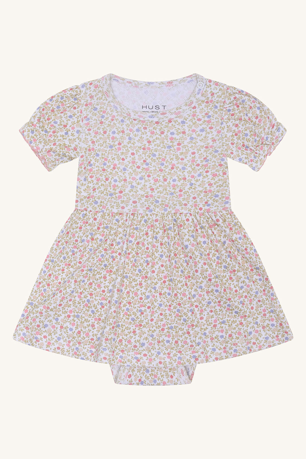 Hust&Claire Kammy Blooming Bodykleid aus GOTS-zertifizierter Baumwolle mit Blumenmuster, erhältlich im Bärechind in Winterthur, Zürich, Schweiz.