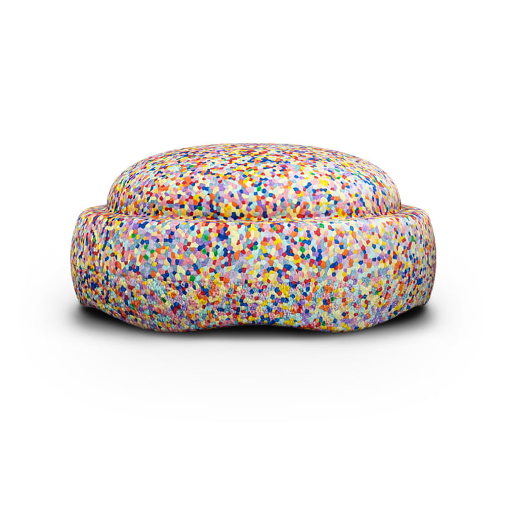 Bunt gesprenkeltes Schaumstoff-Balanceelement, freigestellt auf hellem Hintergrund.