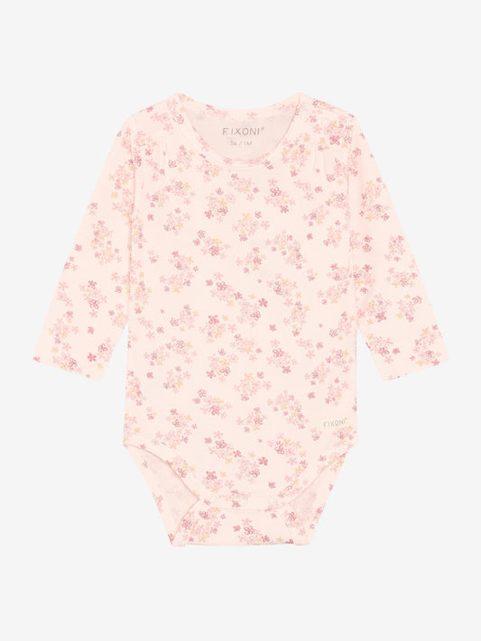 Rosa Langarmbody aus Baumwolle mit Blumenmuster von FIXONI, erhältlich im Bärechind Kinderladen Winterthur Zürich Schweiz