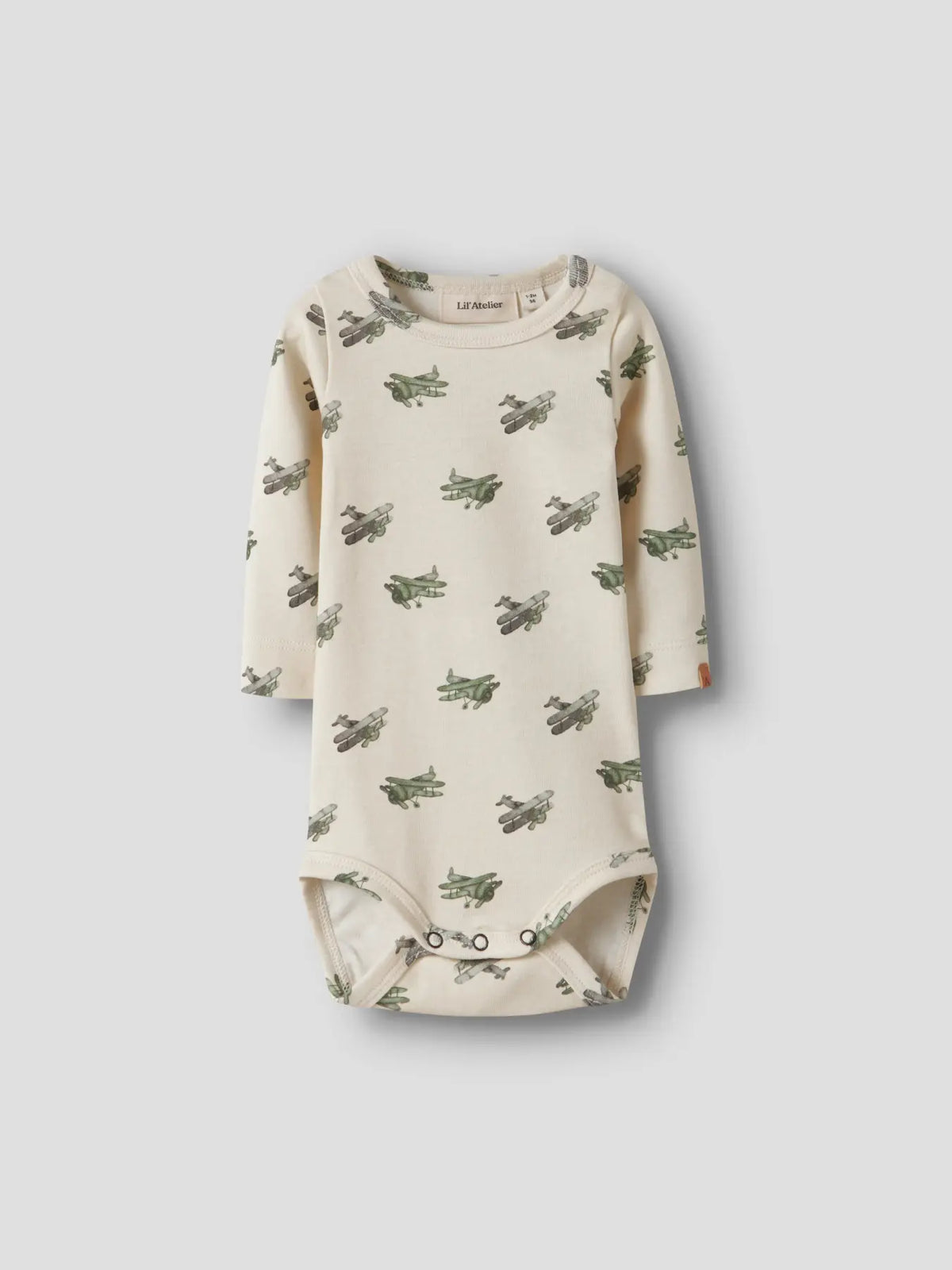 Cremefarbener Langarmbody mit Flugzeug-Print für Babys von Lil’ Atelier im Bärechind Winterthur Zürich Schweiz