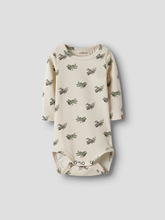Cremefarbener Langarmbody mit Flugzeug-Print für Babys von Lil’ Atelier im Bärechind Winterthur Zürich Schweiz
