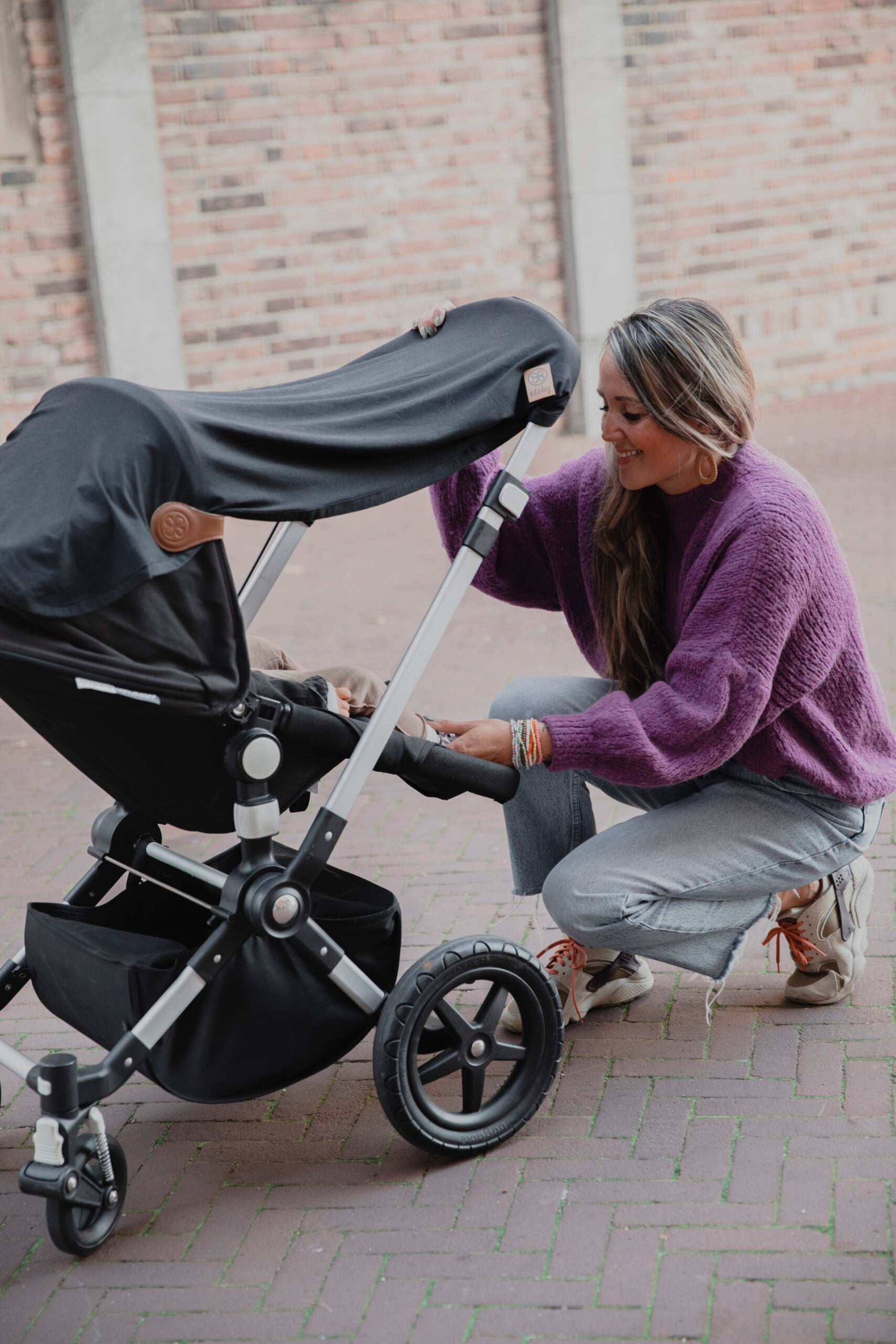 Libby Babydecke im Kinderwagen unterwegs