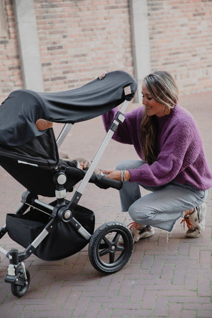 Libby Babydecke im Kinderwagen unterwegs