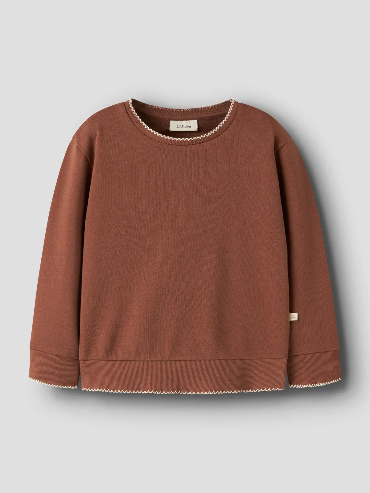 LIL' ATELIER Sweatshirt aus Bio Baumwolle in rostbraun mit kontrastfarbener Ziernaht für Babys und Kinder