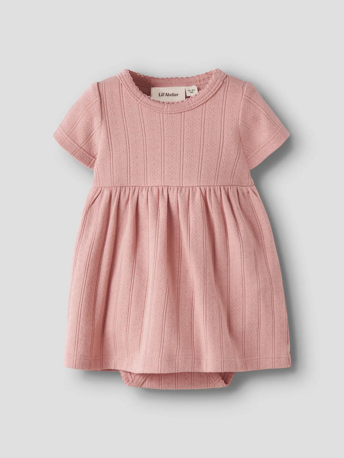 Lil' Atelier Bodykleid aus Bio-Baumwolle in rosa für Babys, erhältlich bei Bärechind Kinderladen Winterthur Zürich Schweiz.