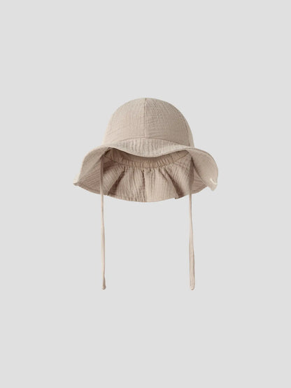 Kinder Sonnenhut in Beige mit strukturierter Oberfläche von Lil’Atelier, erhältlich bei Bärechind in Winterthur, Zürich, Schweiz