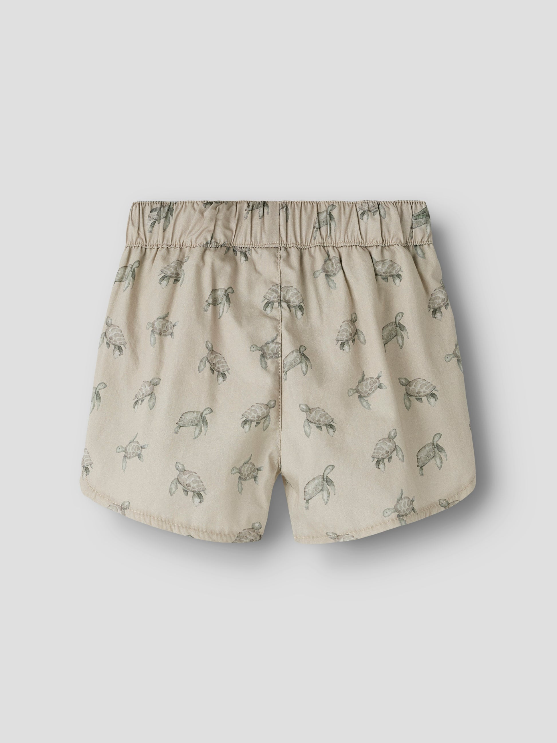 Rückseite der Lil'Atelier Badehose aus Baumwolle mit Schildkrötenmuster bei Bärechind Winterthur, Zürich, Schweiz.