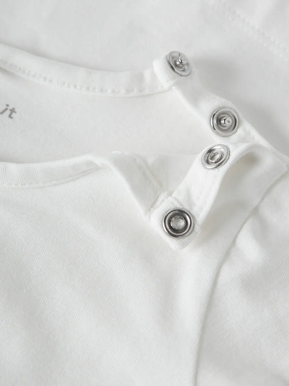 Detail Druckknöpfe am NAME IT Langarmshirt aus Baumwolle zu kaufen im Bärechind Winterthur Zürich Schweiz.