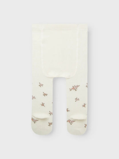 Die Rückseite der weichen Wollstrumpfhose von Name it mit Blumenmuster – erhältlich in Winterthur bei Bärechind.

