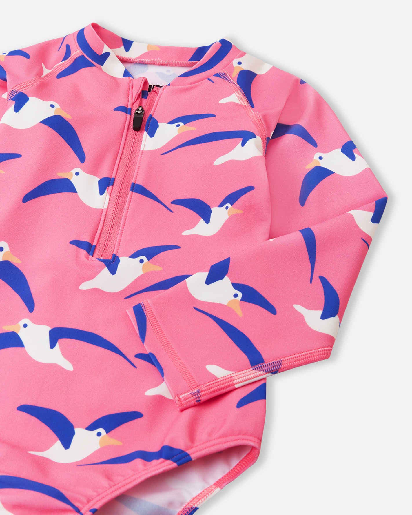Detail Möwen Muster Reima UV Badeanzug Kinder elastisches Material Soft Coral