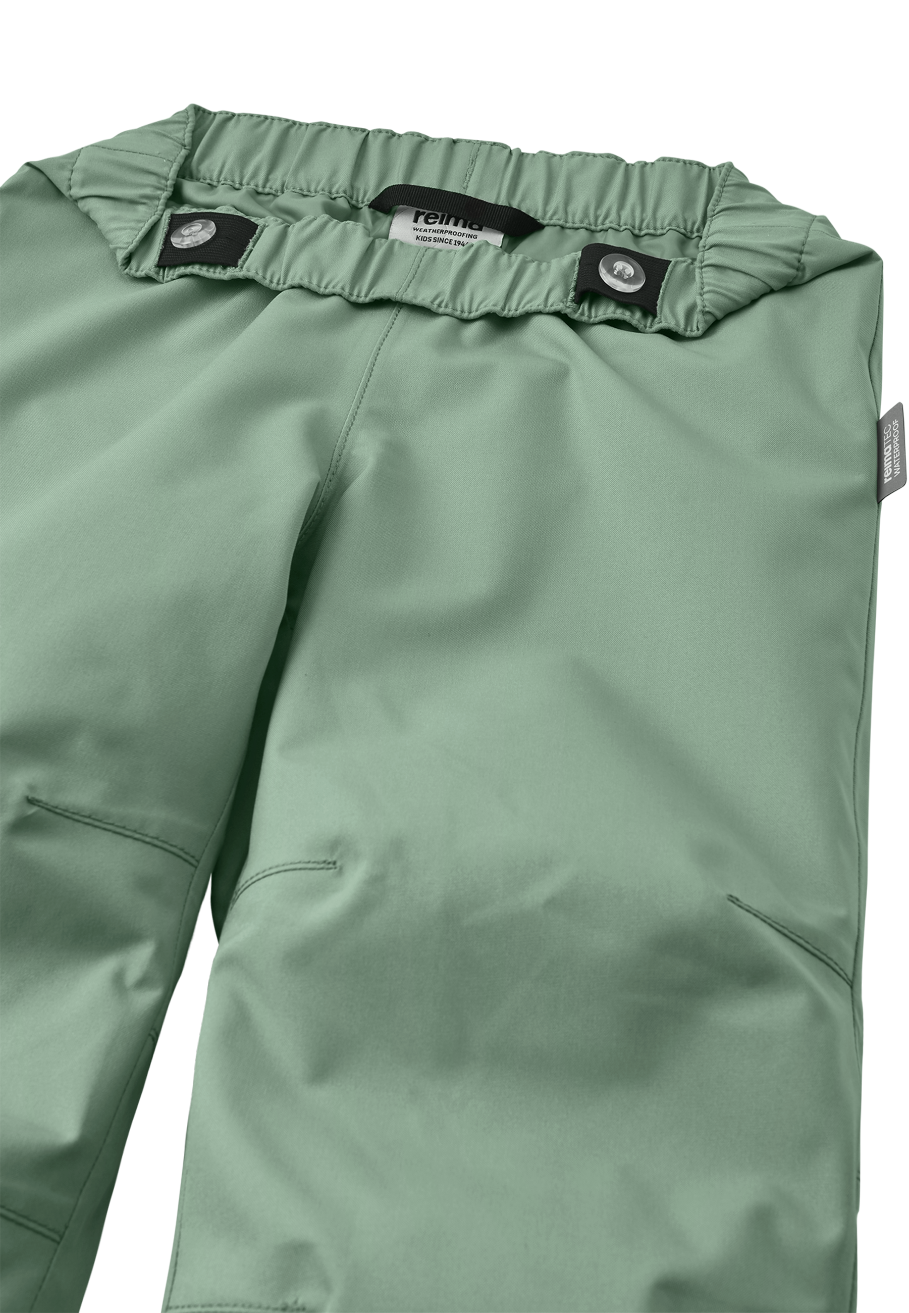 Detailaufnahme der ReimaTec Kaura Kinderhose – robustes, wasserdichtes Material mit verstellbarem Bund.