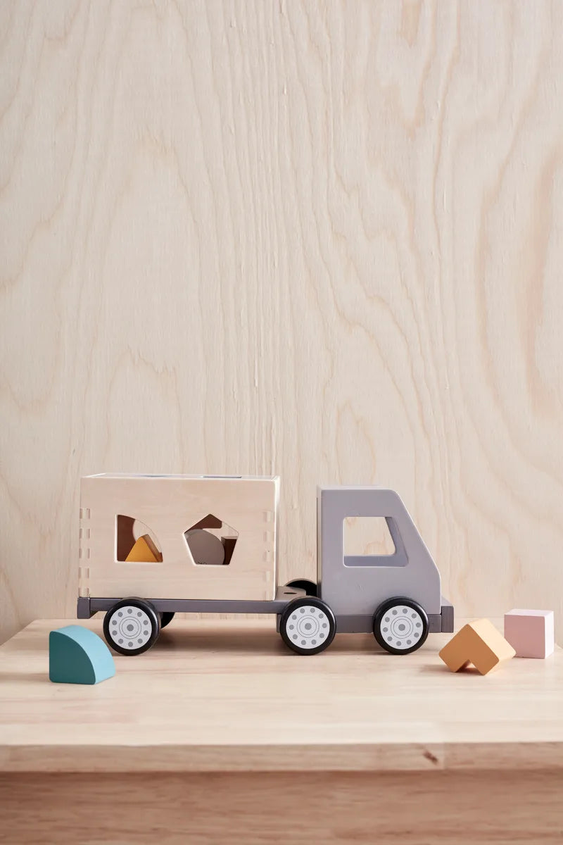 Kinderspielzeug Sortier-Truck mit sechs Formen bei Bärechind kaufen in Winterthur, Zürich, Schweiz.