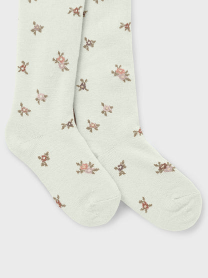 Vorderansicht weisse Wollstrumpfhose mit Blumenmuster für Kinder, Bärechind, Winterthur, Zürich Schweiz
